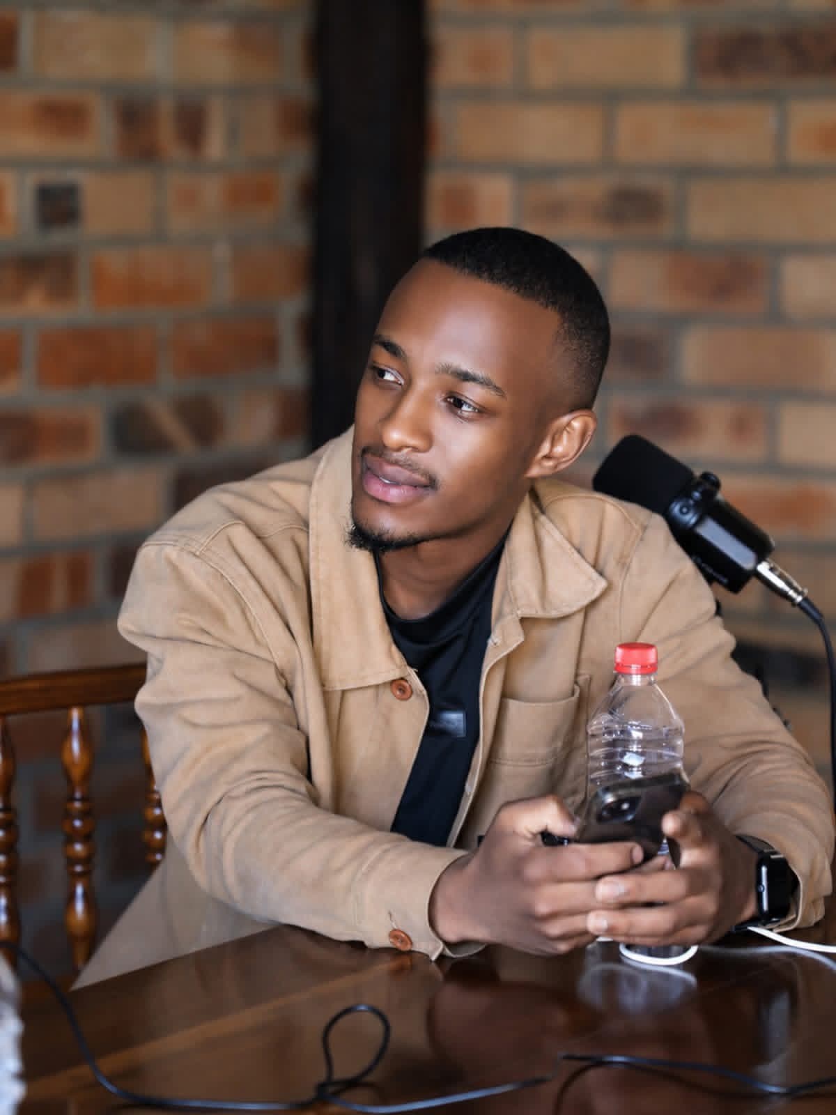 Percy Nhlakanipho Masilela behind the microphone